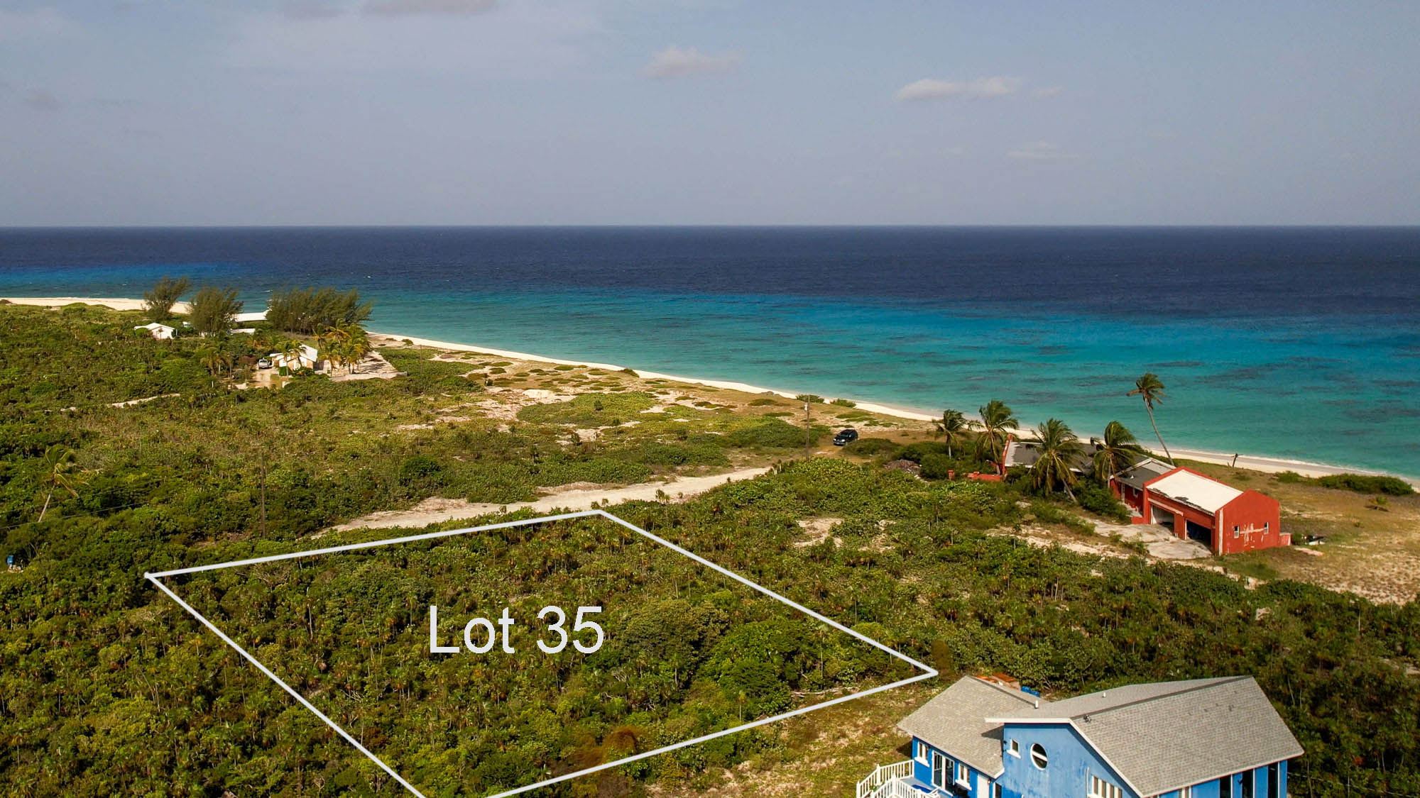 Vacant half acre lot 2 lots from stunning beach in Sandy Point, San Salvador, The Bahamas