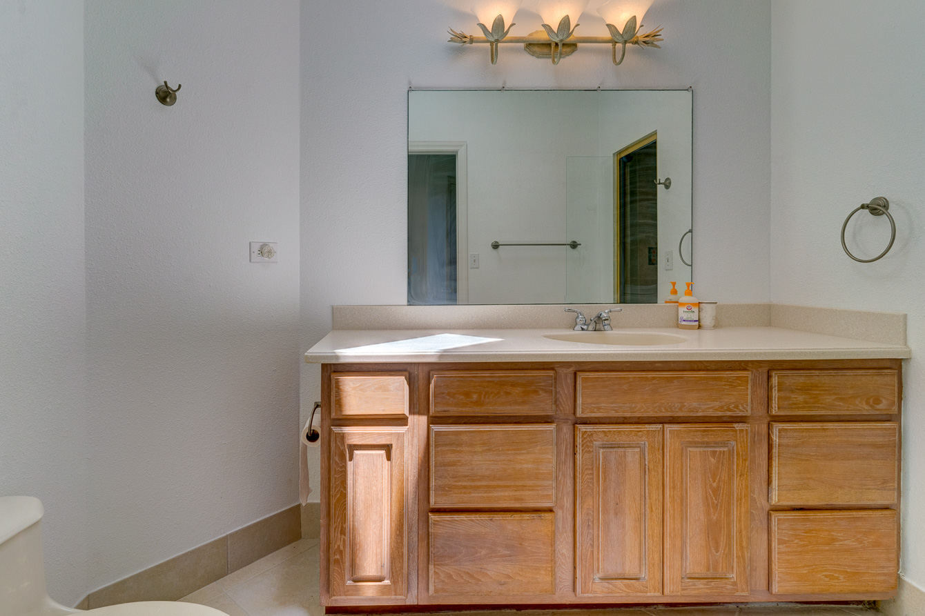 The bathroom for Guestroom 1 at The Family Beach House on San Salvador