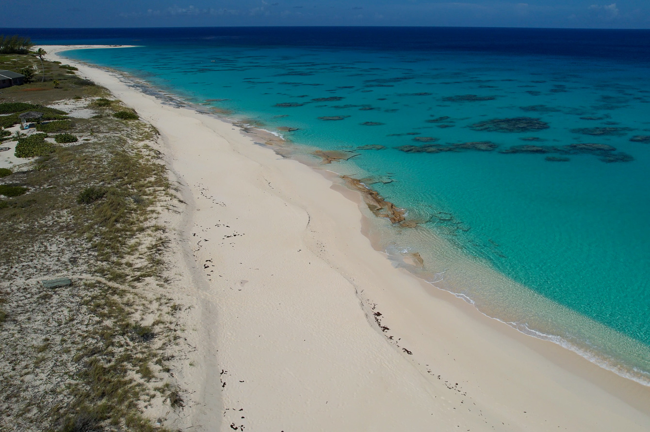 Aerial of the beach by The Family Beach House on San Salvador